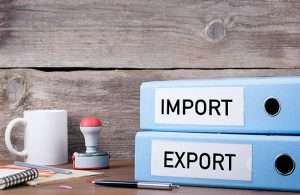 import and export. two binders on desk in the office. business background
